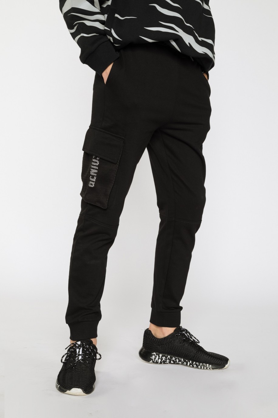 Czarne spodnie dresowe dla chłopaka CREATIVE SKILLS - 31602