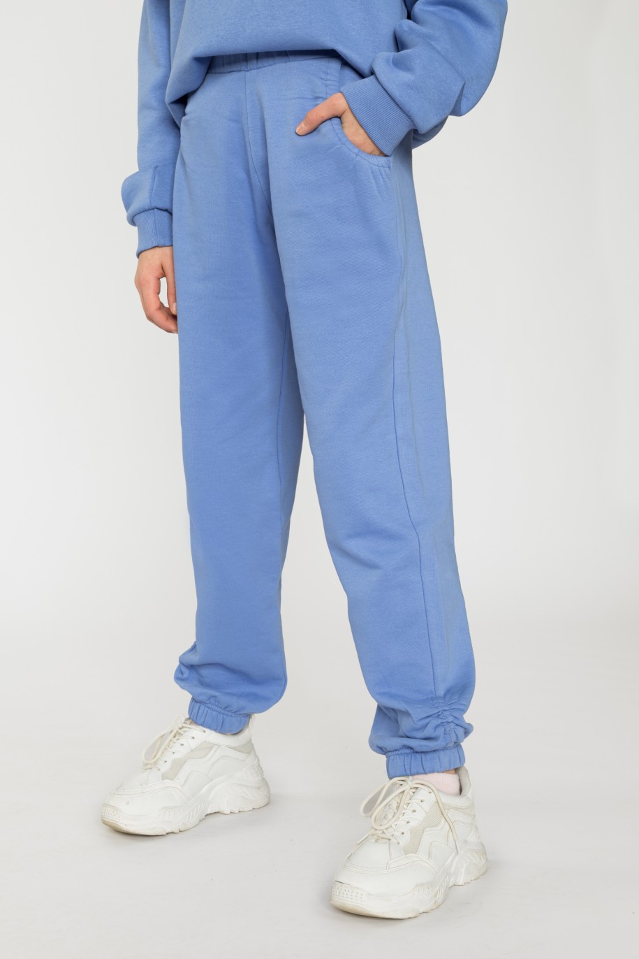 Niebieskie spodnie dresowe dla dziewczyny ze ściągaczami - 31813
