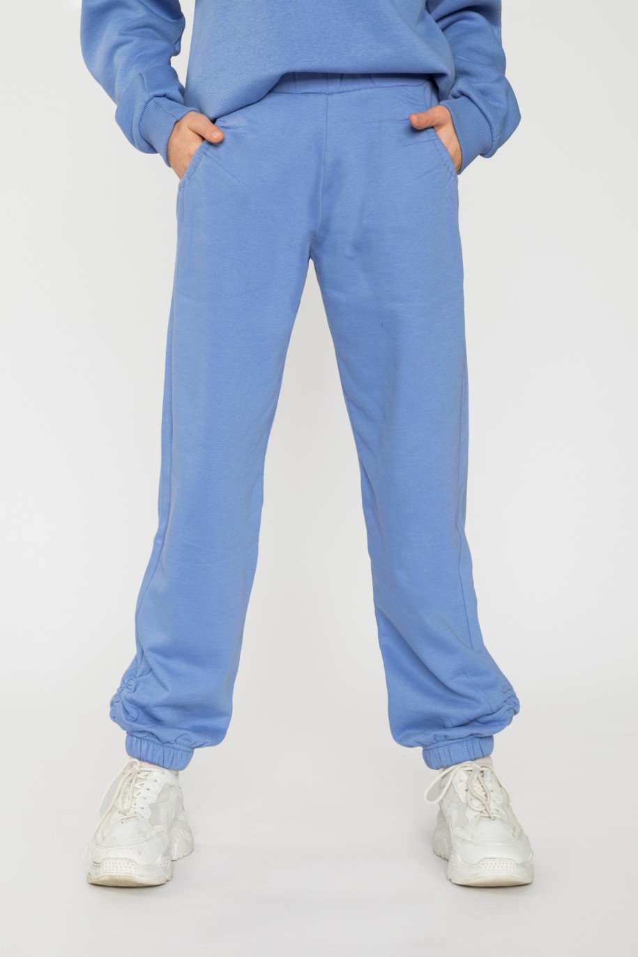 Niebieskie spodnie dresowe dla dziewczyny ze ściągaczami - 31815