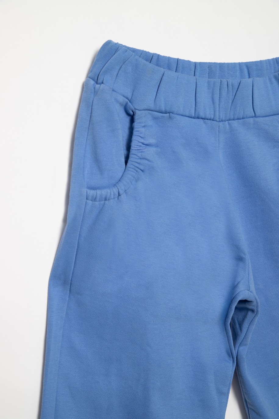 Niebieskie spodnie dresowe dla dziewczyny ze ściągaczami - 31817