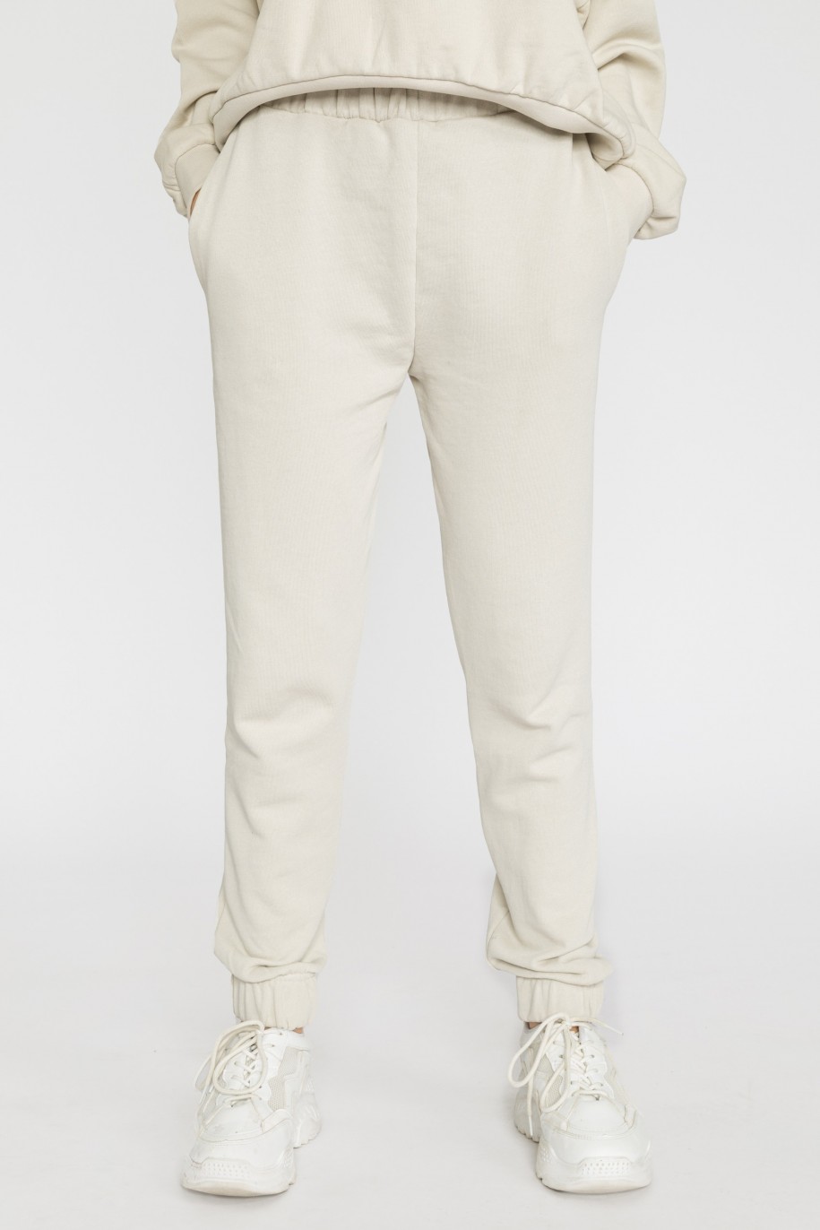 Kremowe spodnie dresowe dla dziewczyny - 31938