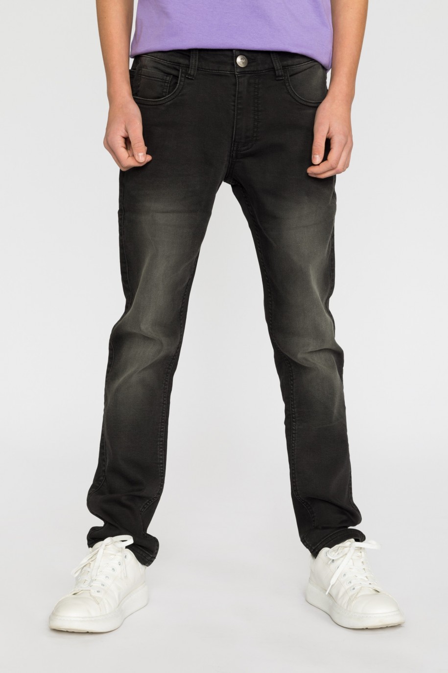 Czarne jeansowe spodnie dla chłopaka - 32097
