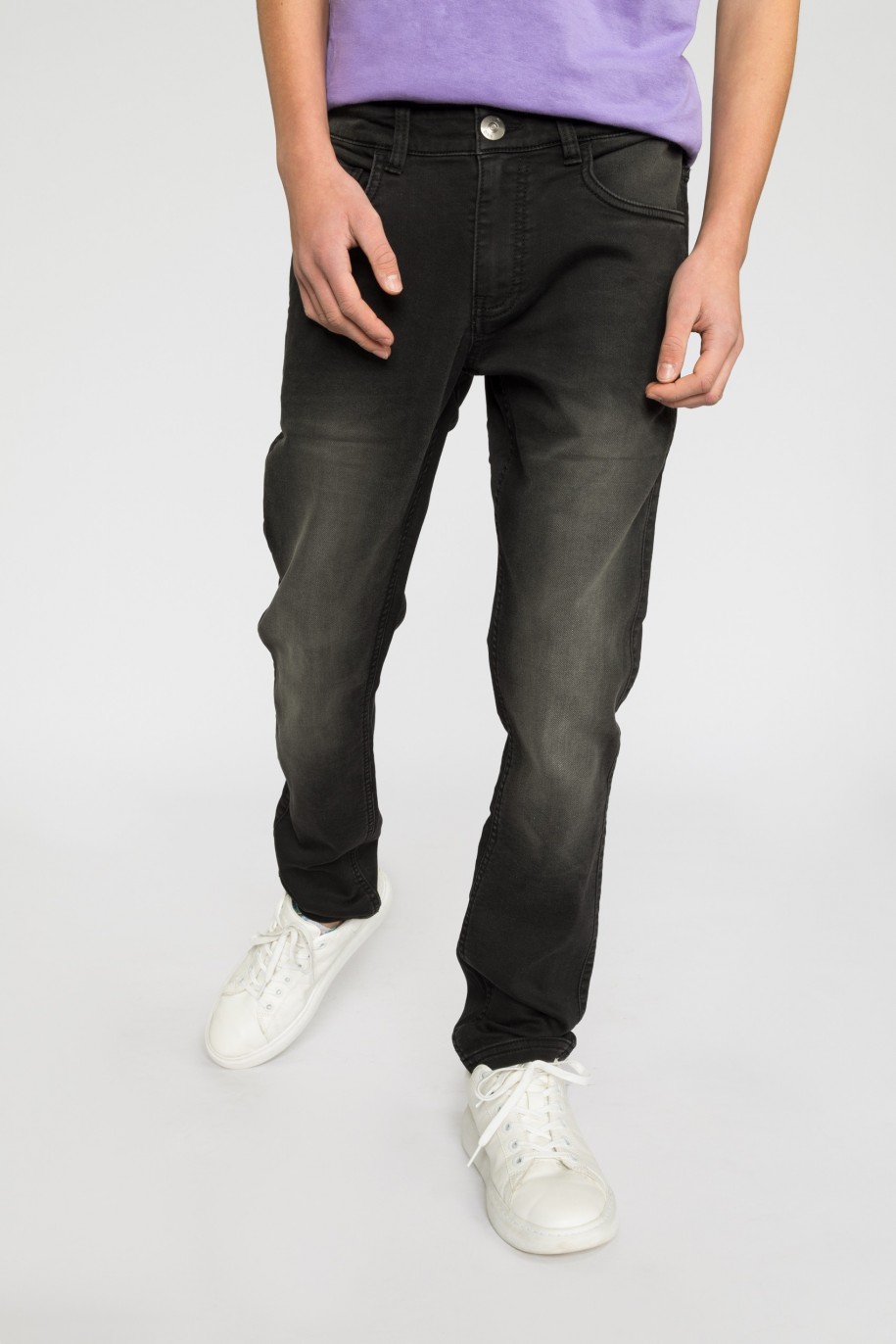 Czarne jeansowe spodnie dla chłopaka - 32098