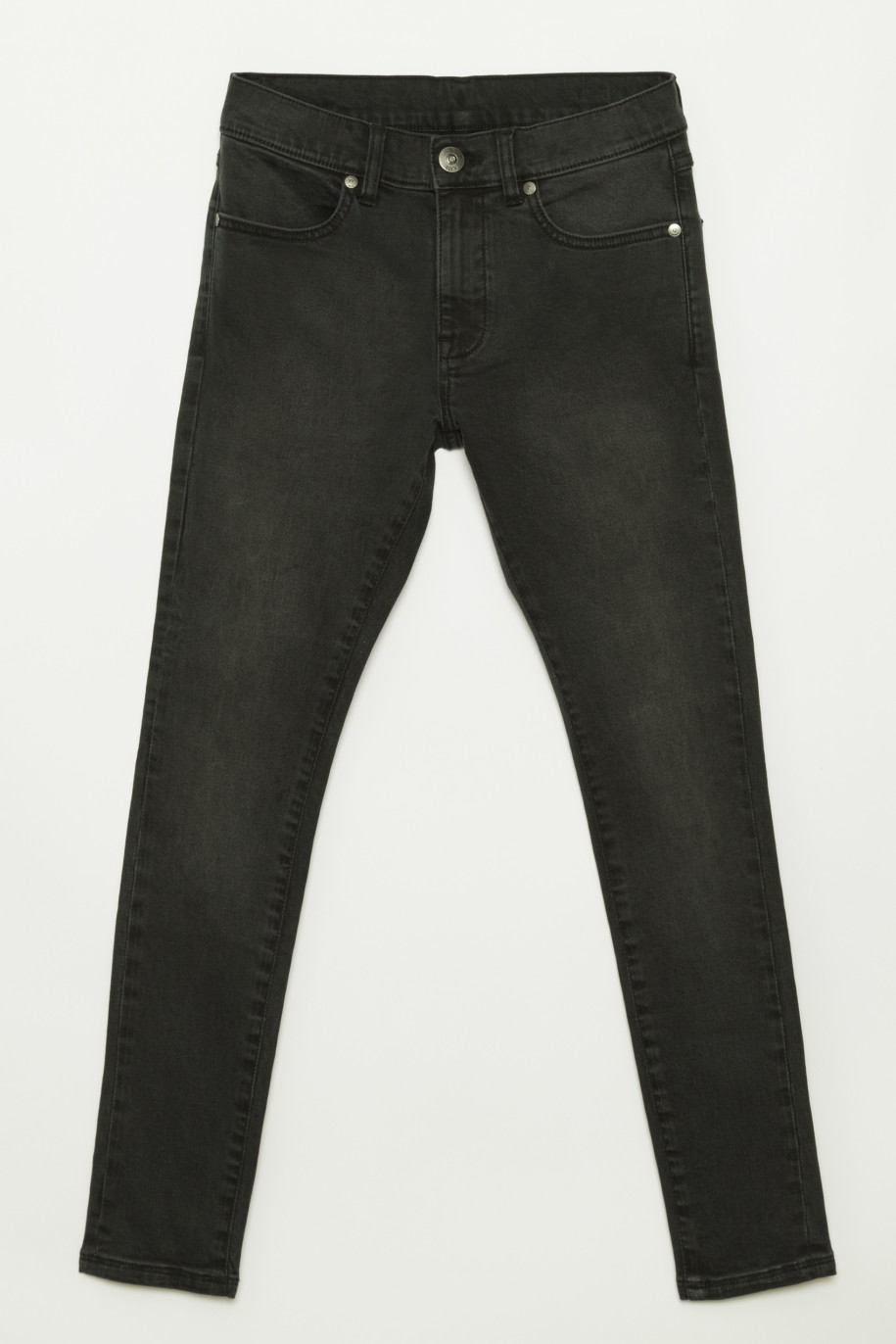 Czarne jeansowe zwężane ku dołowi spodnie dla chłopaka - 32644