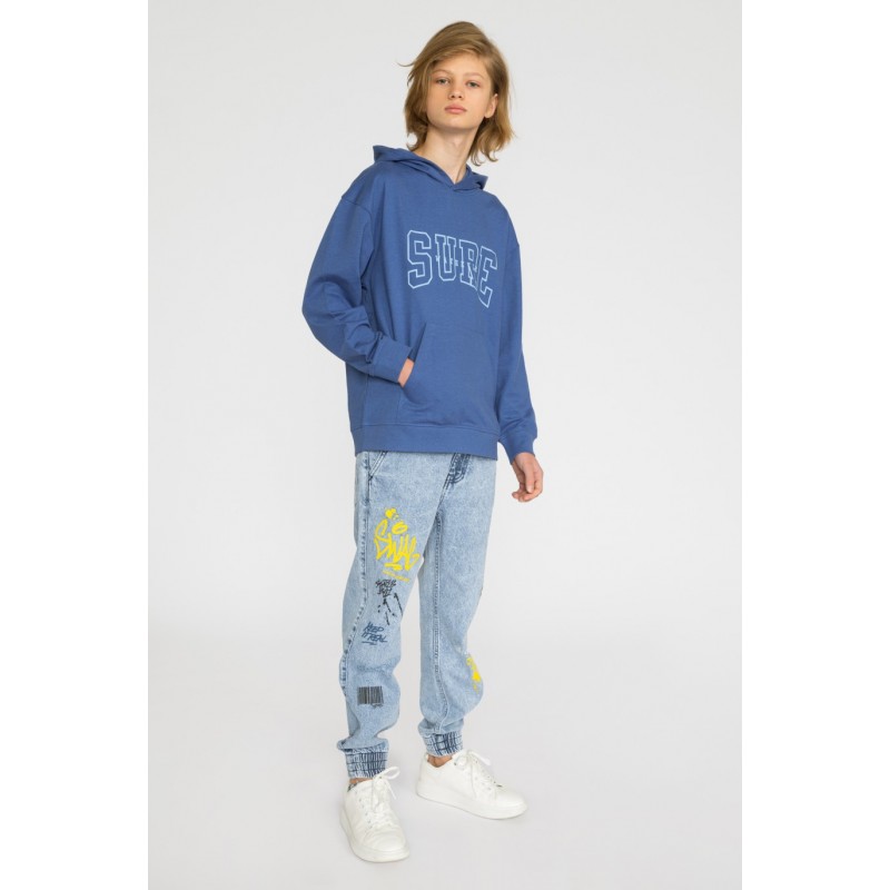 Niebieskie jeansy typu jogger z nadrukami dla chłopaka - 33453