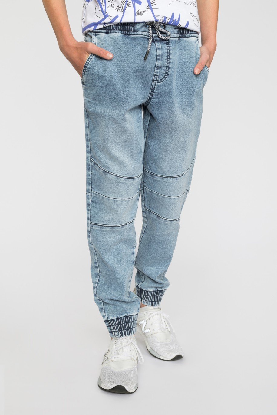 Niebieskie jeansy typu jogger ze ściągaczami dla chłopaka - 33580
