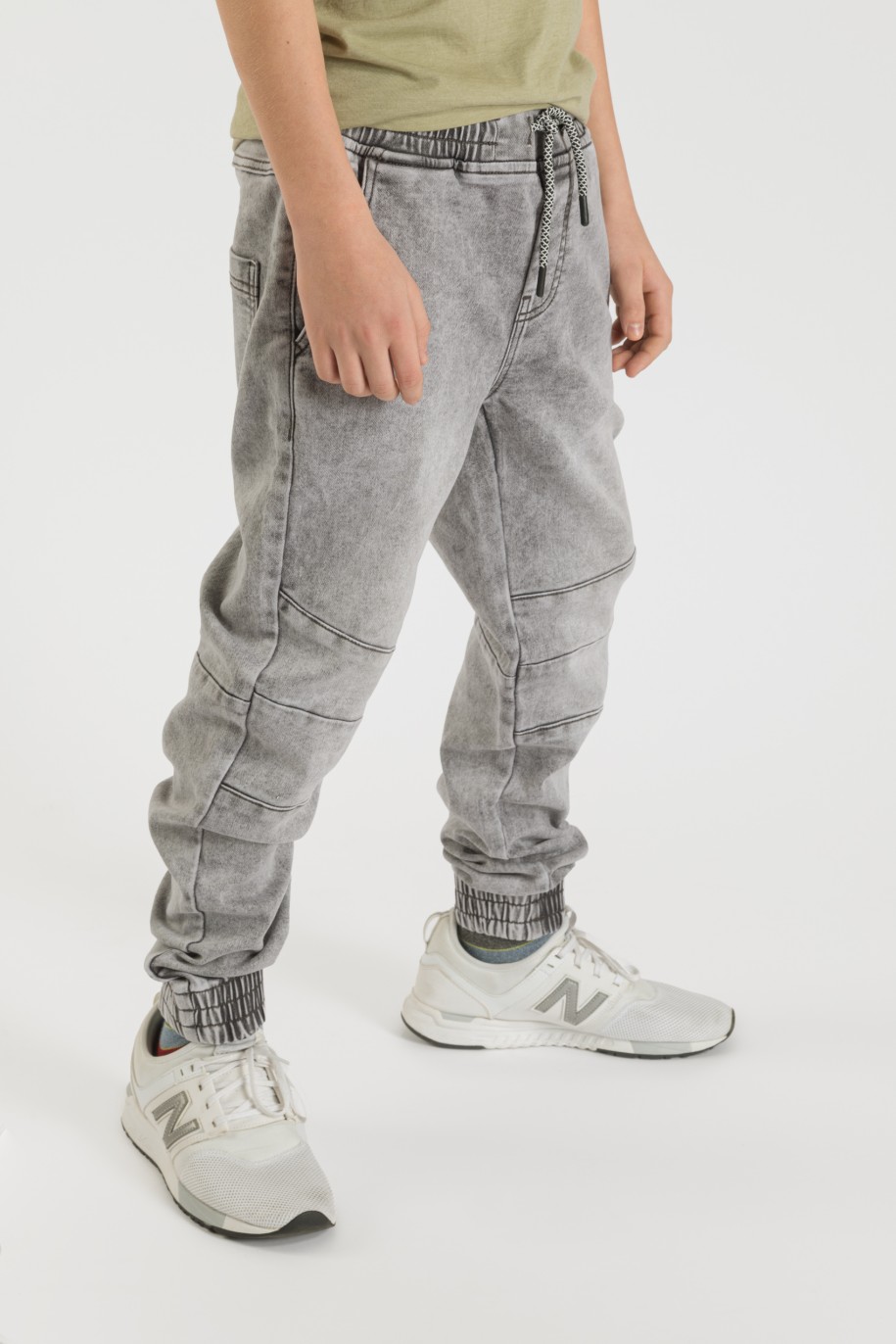 Szare jeansy typu jogger ze ściągaczami dla chłopaka - 33586