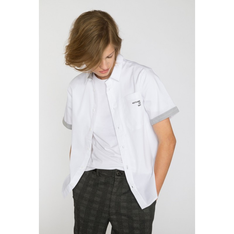 Biała koszula z krótkim rękawem i ozdobnymi mankietami dla chłopaka - 33842
