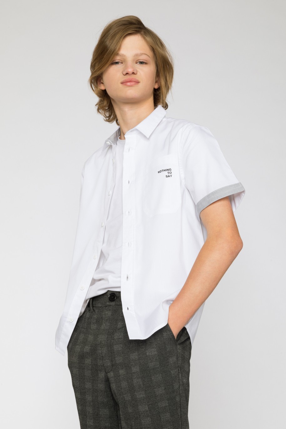 Biała koszula z krótkim rękawem i ozdobnymi mankietami dla chłopaka - 33844