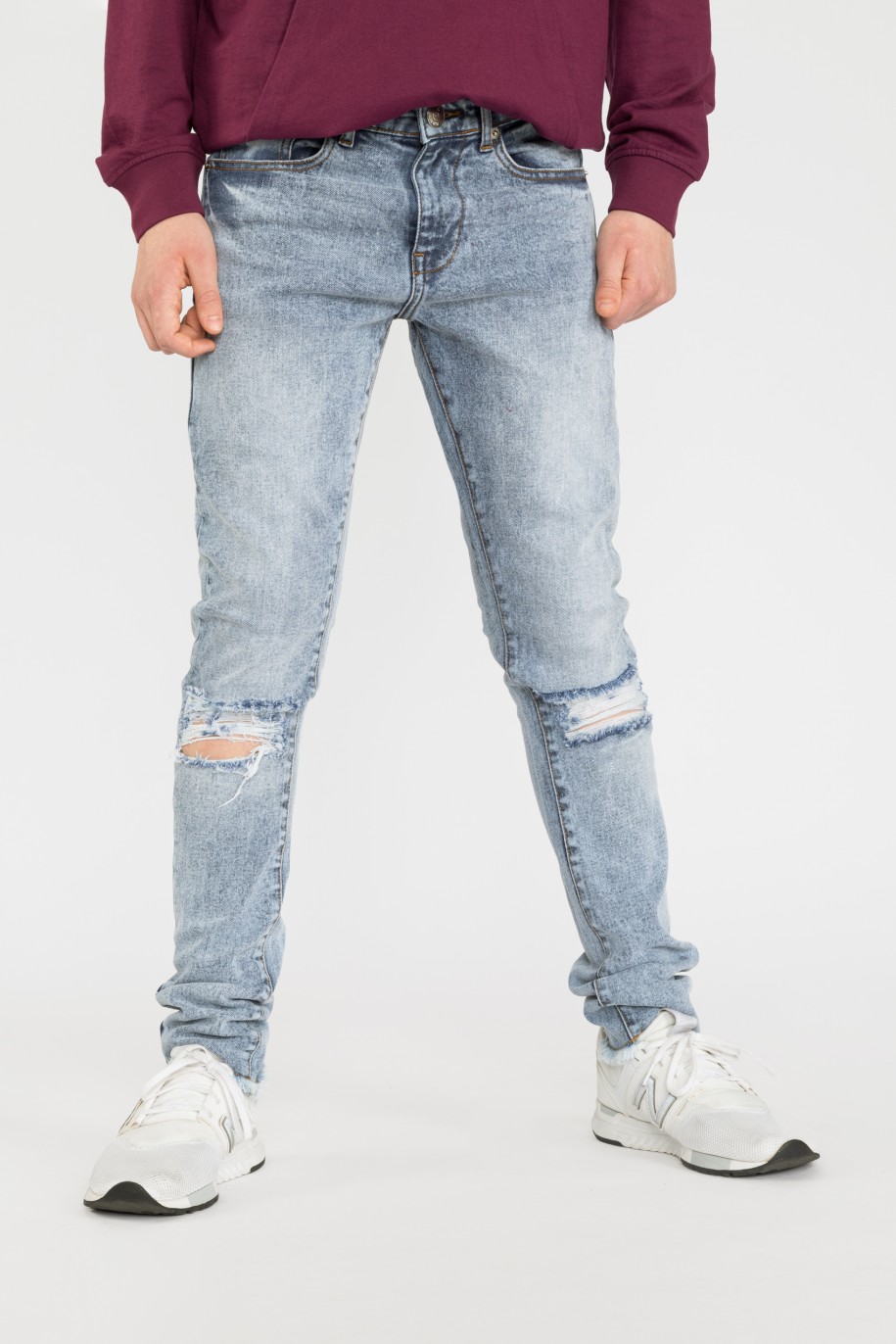 Niebieskie jeansy z przetarciami - 34475