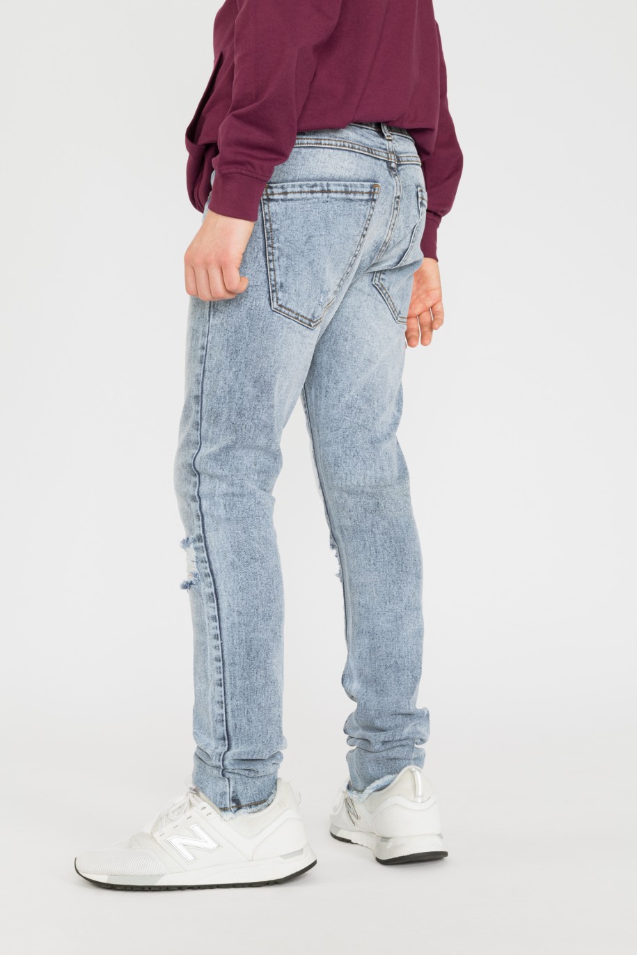 Niebieskie jeansy z przetarciami - 34476