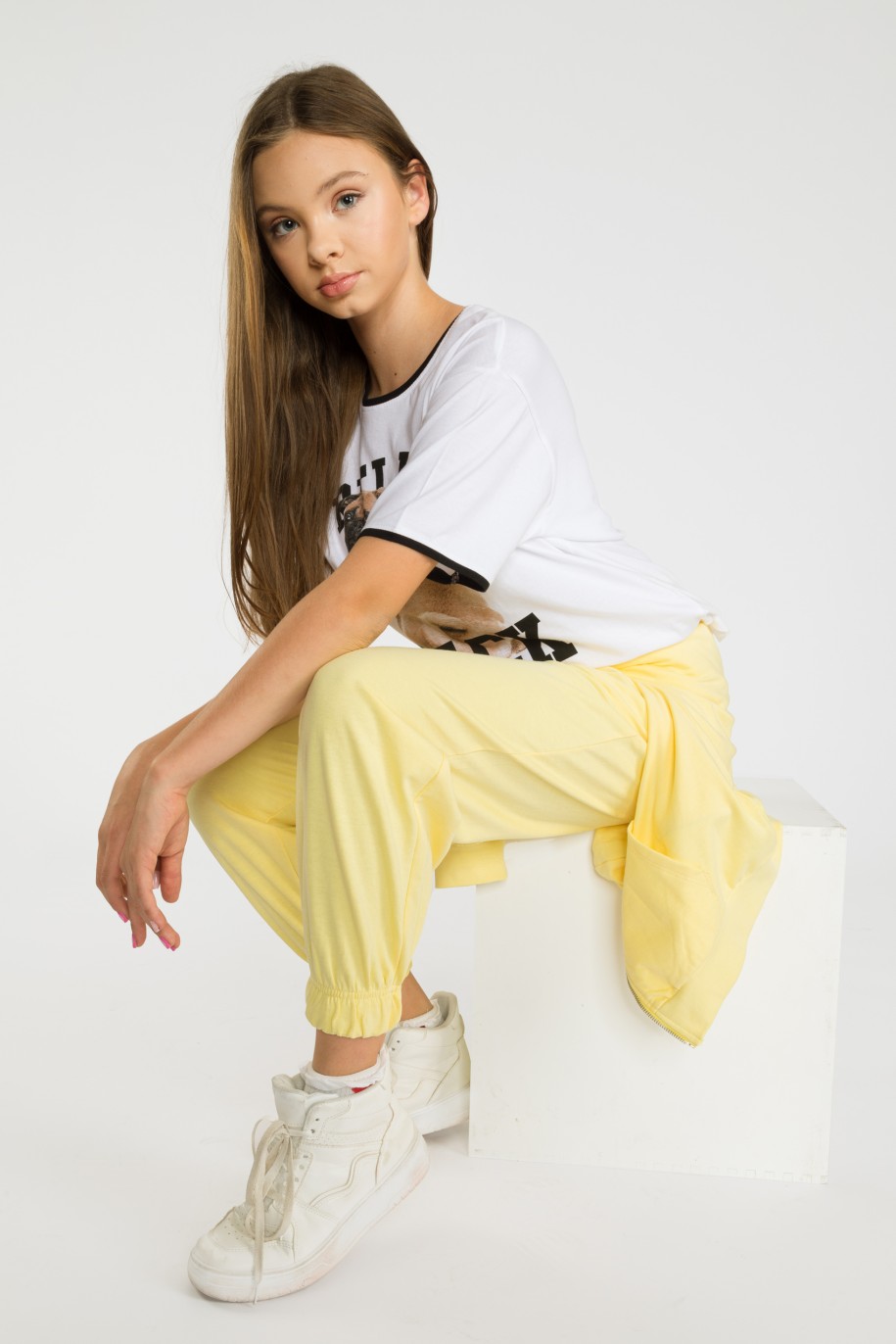 Żółte pastelowe spodnie dresowe ze ściągaczem - 36274
