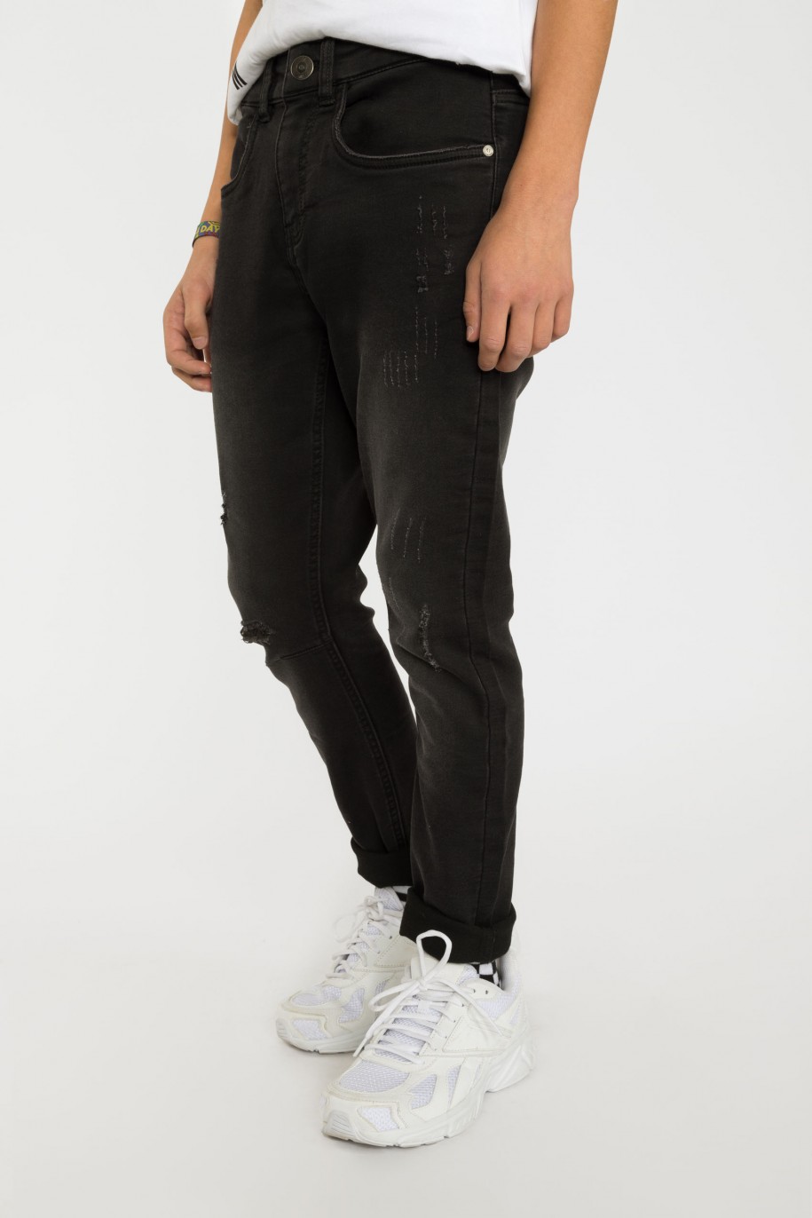 Czarne jeansy z przetarciami - 38207