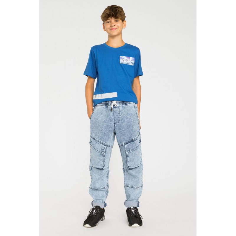Niebieskie marmurkowe jeansy typu jogger z kieszeniami - 38368