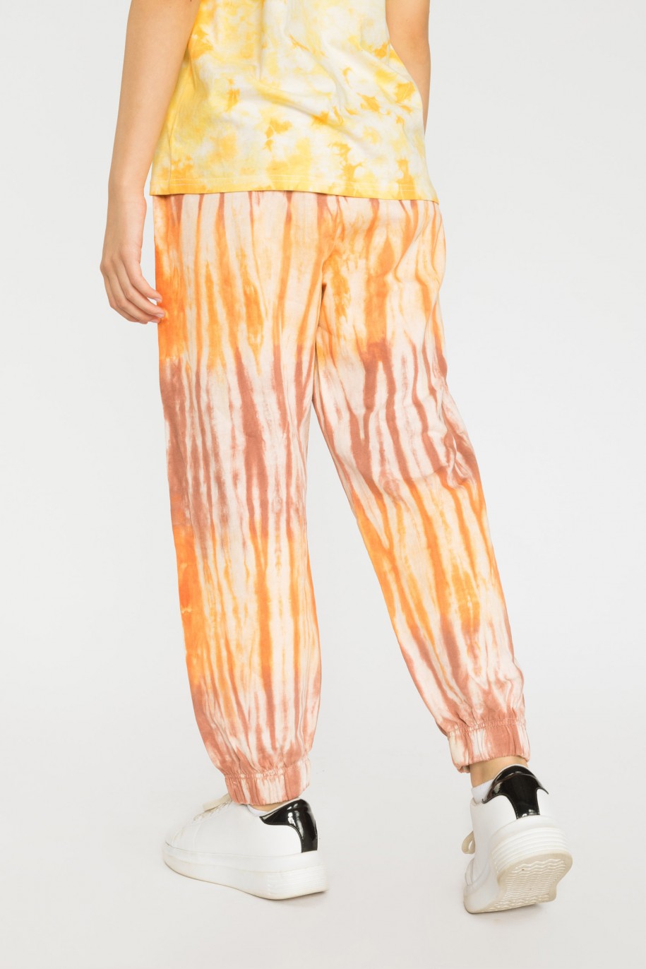 Wielobarwne spodnie dresowe tie dye - 39762