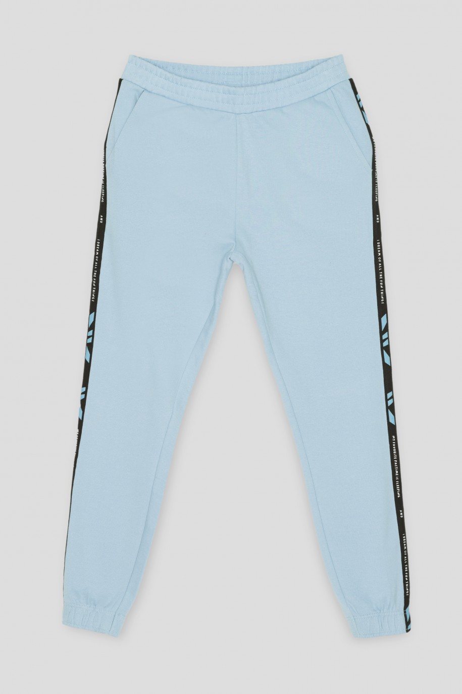 Błękitne spodnie dresowe z lampasami - 39995