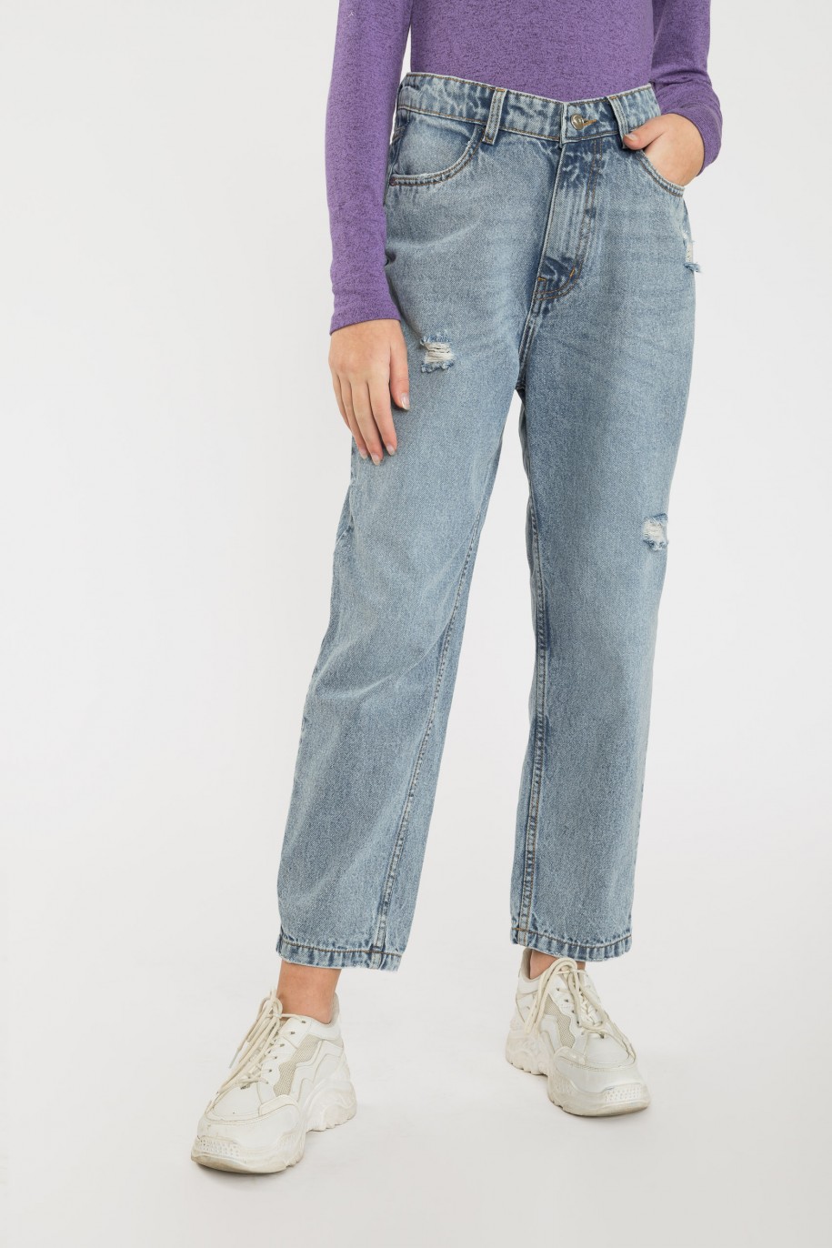 Niebieskie jeansy z ozdobnymi rozdarciami - 40370