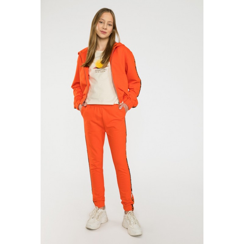 Pomarańczowe spodnie dresowe z ozdobnymi lampasami - 40511