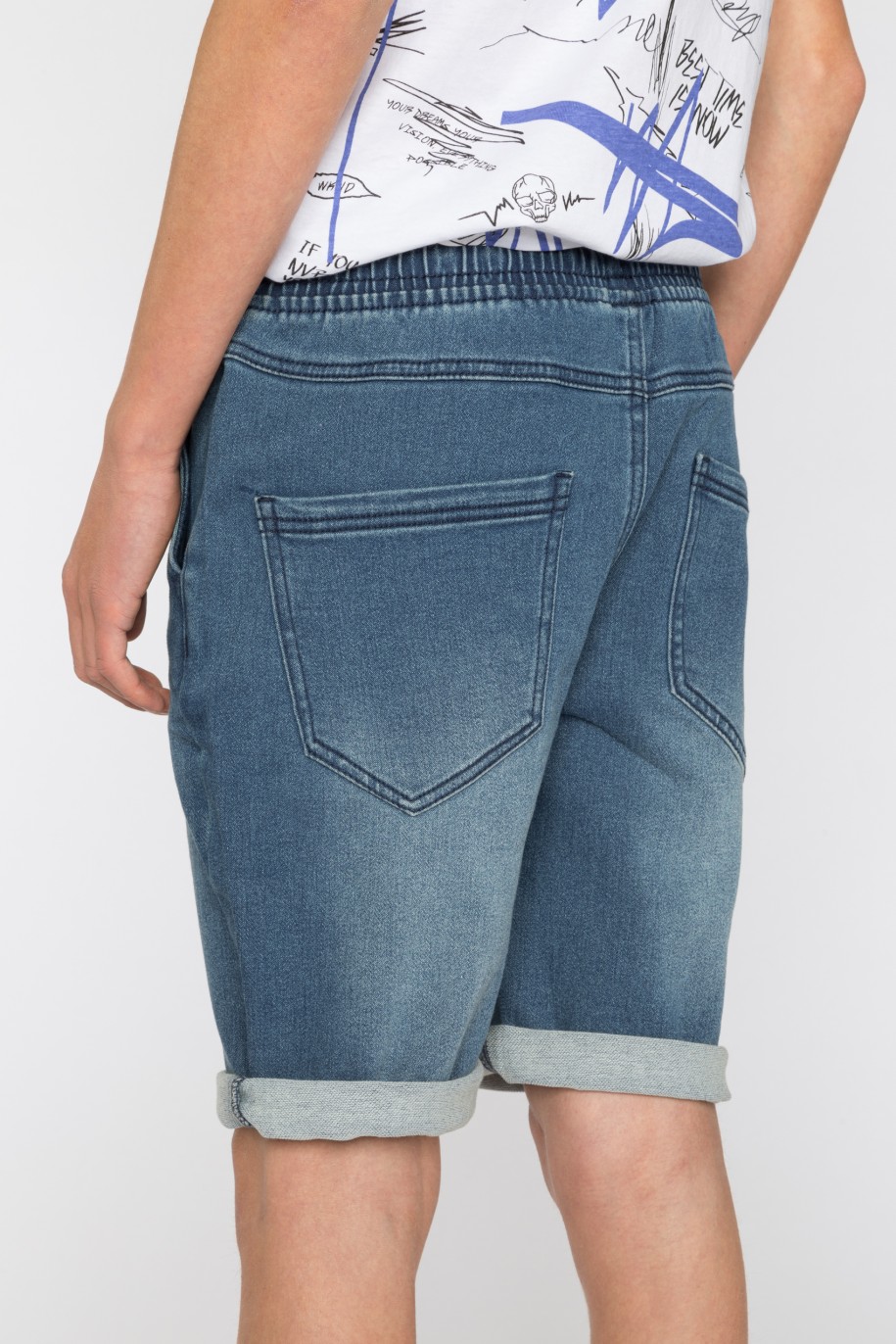Krótkie niebieskie jeansowe spodenki dla chłopaka - 41205