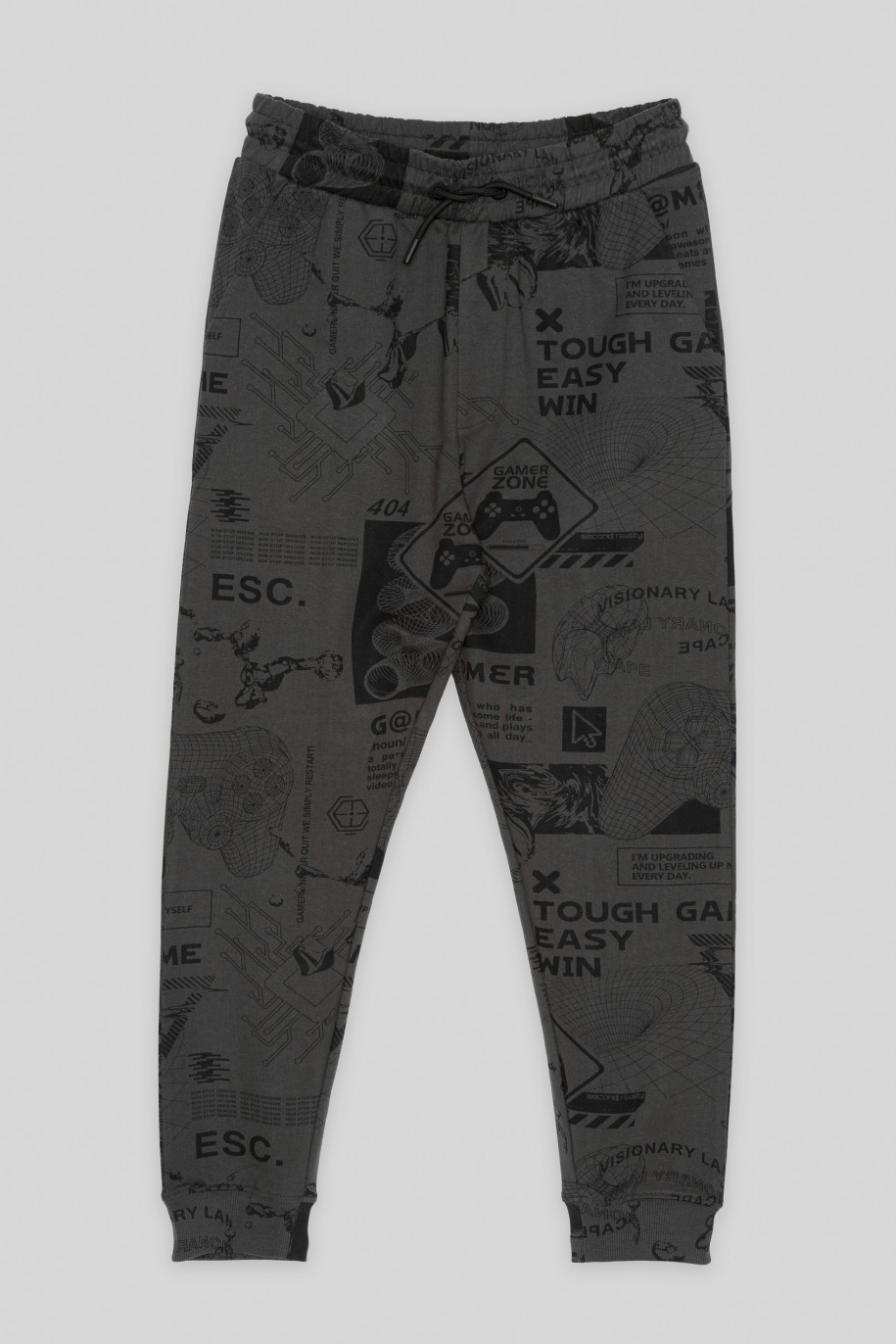 Szare spodnie dresowe dresowe z nadrukami na całości - 43528