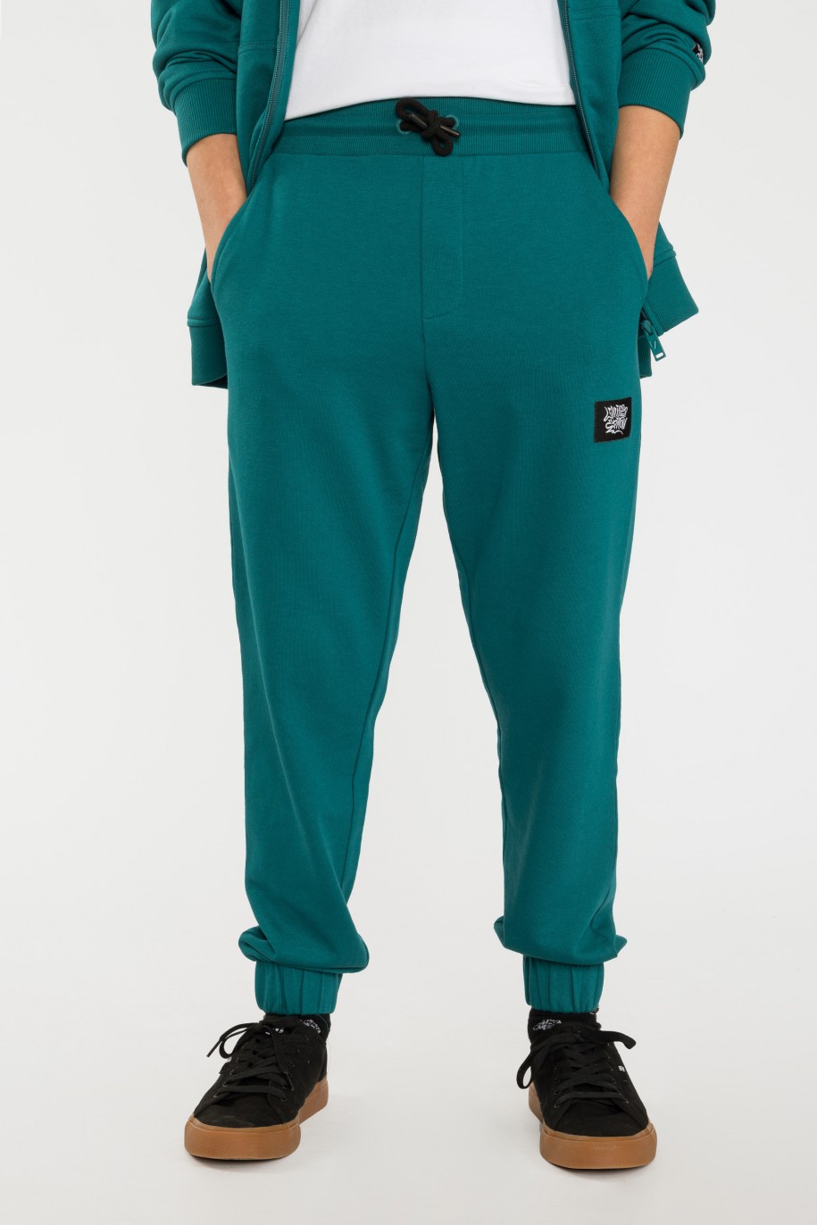 Spodnie dresowe w kolorze morskim - 44506