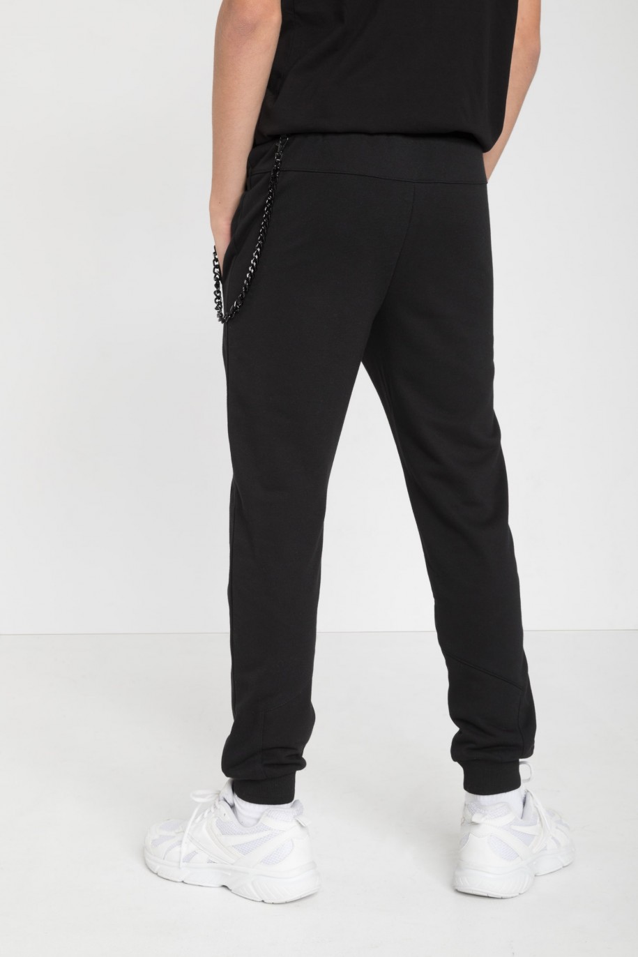 Czarne spodnie dresowe z odpinanym łańcuchem - 45195