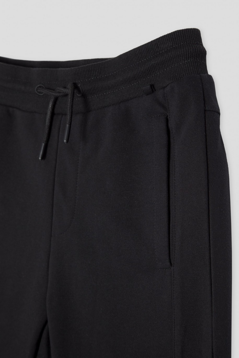Czarne spodnie dresowe z odpinanym łańcuchem - 45199