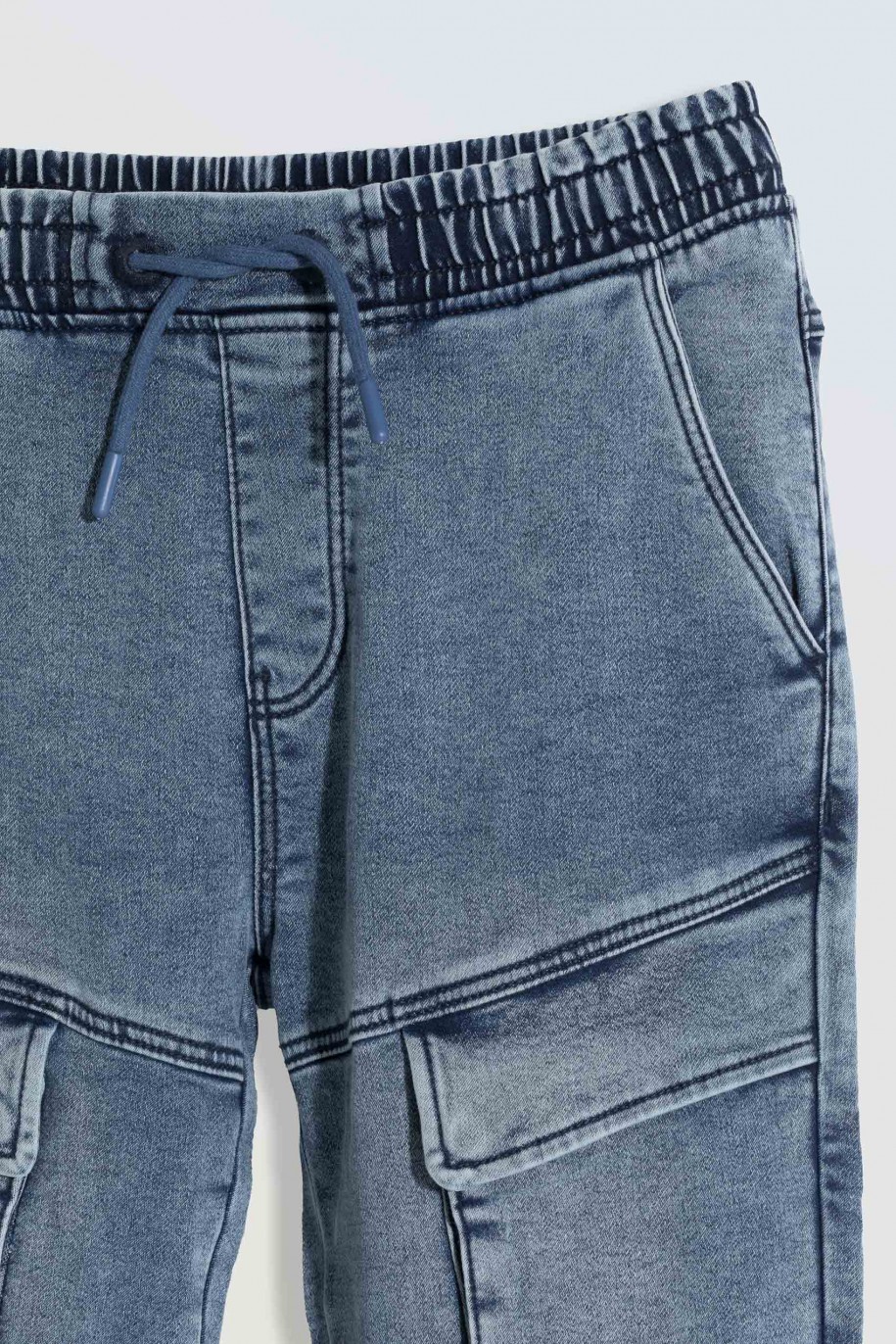 Niebieskie marmurkowe jeansy typu joggery z kieszeniami - 46015