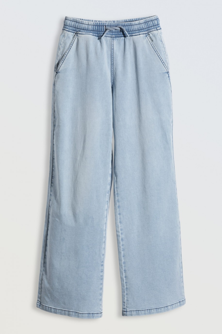 Jasnoniebieskie jeansy z szerokimi nogawkami - 46173