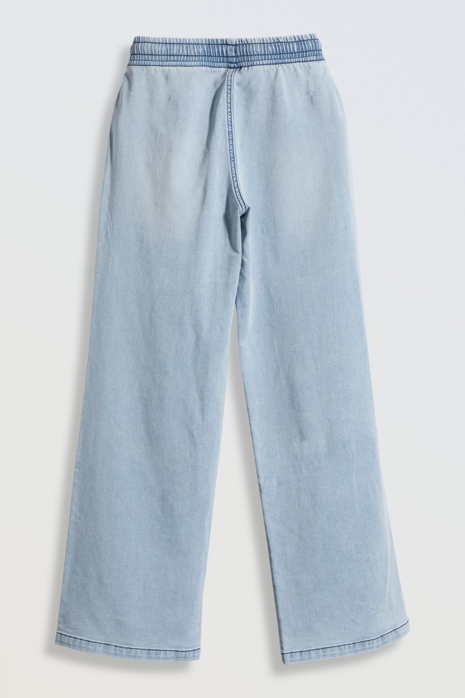 Jasnoniebieskie jeansy z szerokimi nogawkami - 46174