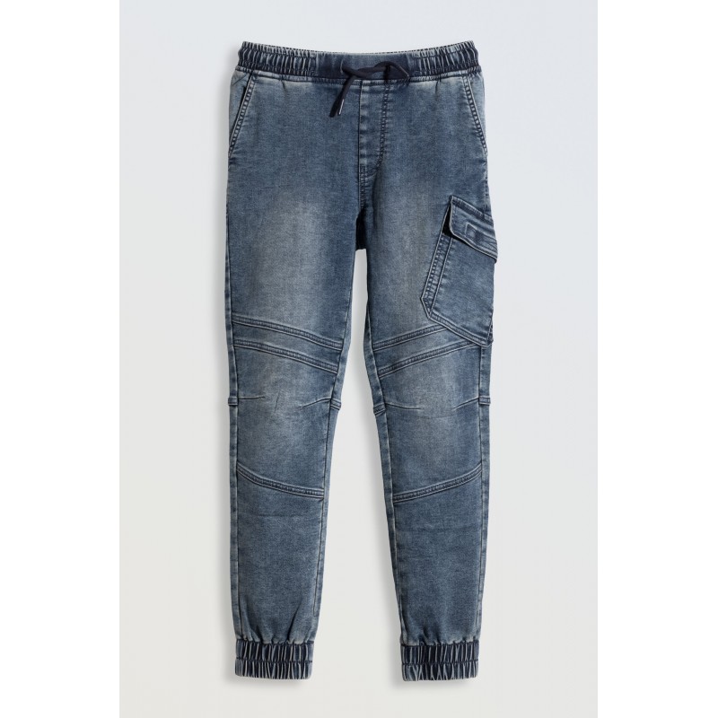 Niebieskie spodnie jeansowe typu joggery z modnymi przeszyciami - 46196