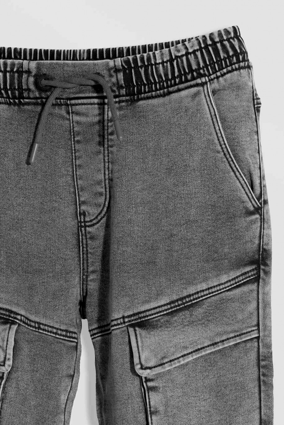Czarne jeansy typu joggery z kieszeniami - 46353