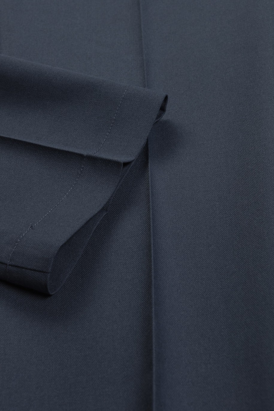 Niebieskie spodnie garniturowe z tkaniny melanż - 46360
