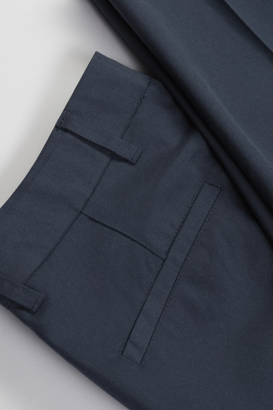 Niebieskie spodnie garniturowe z tkaniny melanż - 46361