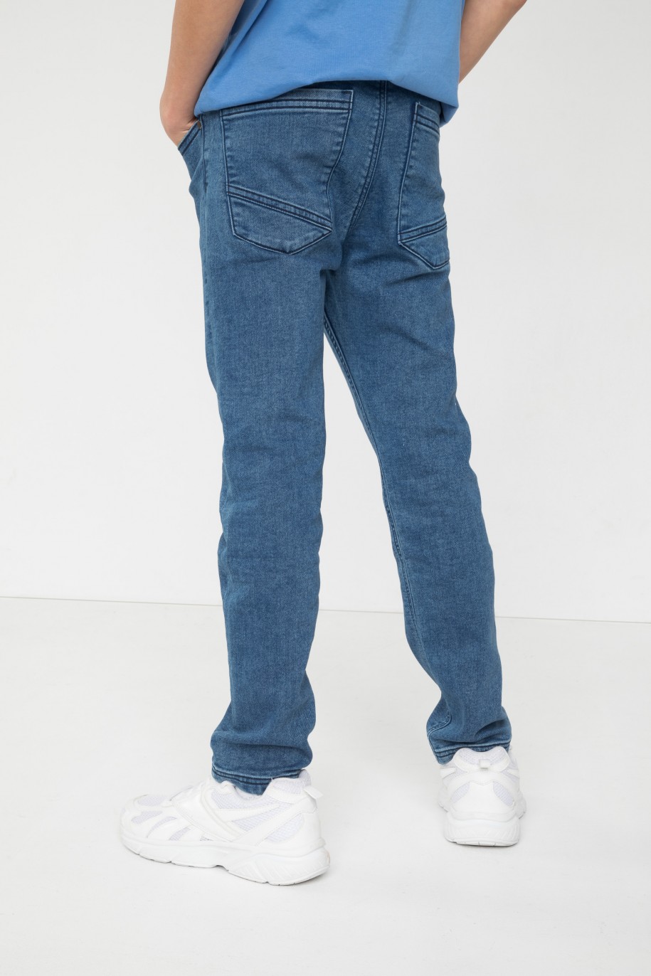 Niebieskie jeansy z wąskimi nogawkami - 46540