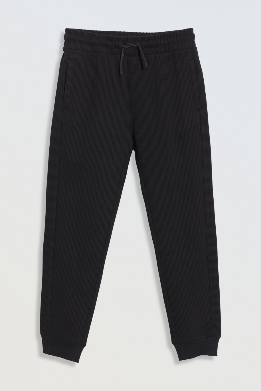 Czarne spodnie dresowe z dzianiny prążkowanej - 46921