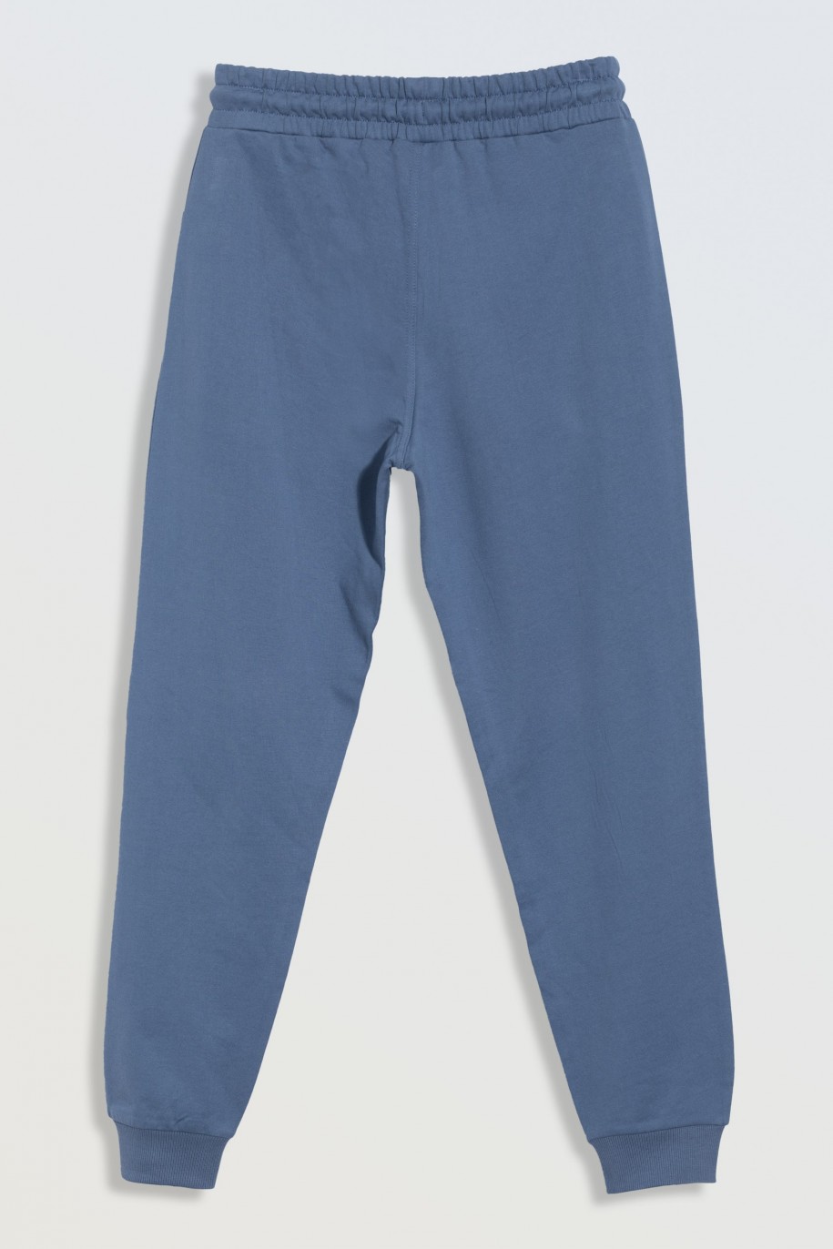 Niebieskie spodnie dresowe z kieszeniami zapinanymi na zamek - 47162