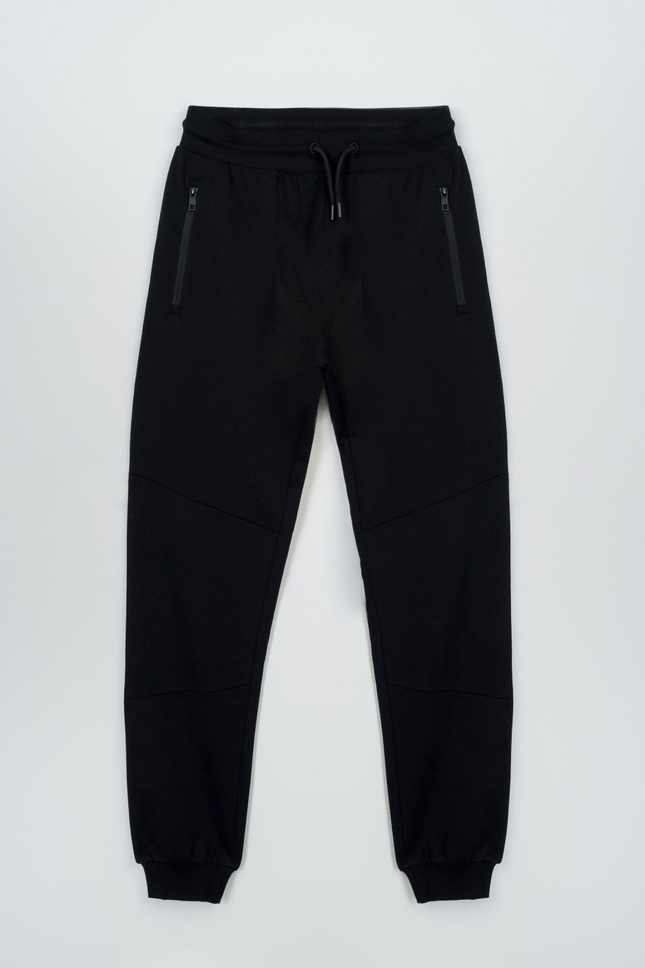 Czarne spodnie dresowe z modnymi cięciami na nogawkach - 47259